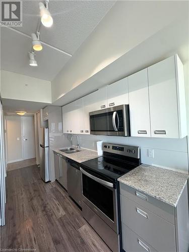 257 Hemlock Street Unit# 610, Waterloo, ON - Indoor Photo Showing Kitchen With Double Sink