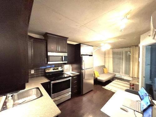 Overall view - 305-1235 Rue Bishop, Montréal (Ville-Marie), QC - Indoor Photo Showing Kitchen With Double Sink