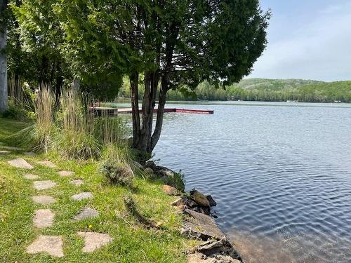 Vue sur l'eau - 2576 Ch. Des Bouleaux, La Conception, QC - Outdoor With Body Of Water With View