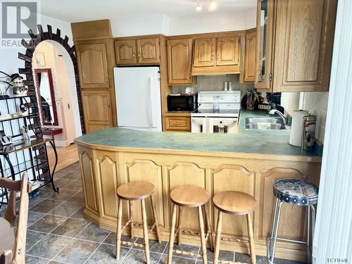 71 Pine Ave, Smooth Rock Falls, ON - Indoor Photo Showing Kitchen With Double Sink