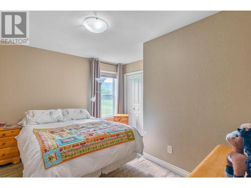 94 Tomkinson Road, Grindrod, BC - Indoor Photo Showing Bedroom