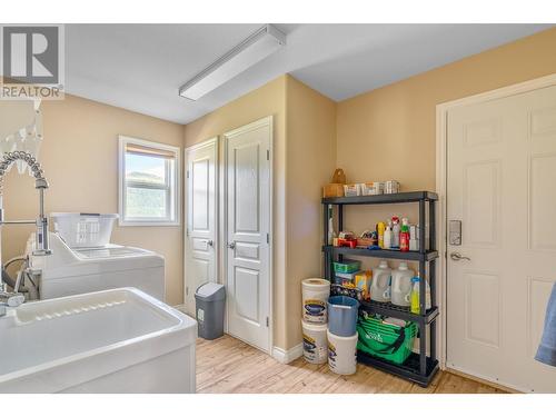 94 Tomkinson Road, Grindrod, BC - Indoor Photo Showing Laundry Room