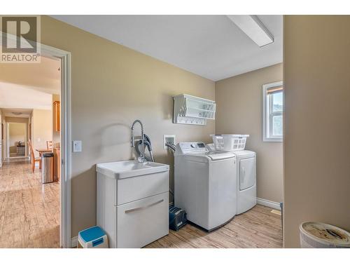 94 Tomkinson Road, Grindrod, BC - Indoor Photo Showing Laundry Room