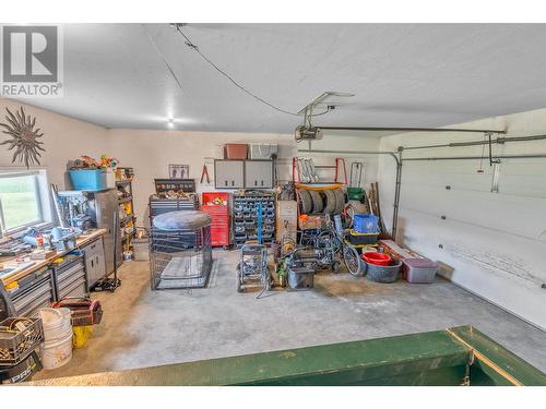 94 Tomkinson Road, Grindrod, BC - Indoor Photo Showing Garage