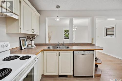 250 Stillwater Drive, Saskatoon, SK - Indoor Photo Showing Kitchen With Double Sink