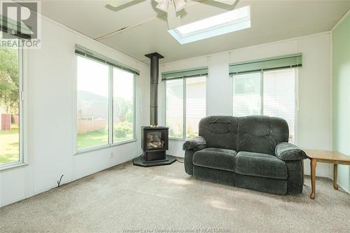 330 Mayfair Avenue, Lasalle, ON - Indoor Photo Showing Living Room With Fireplace