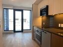 Living room - 2010-2060 Rue Peel, Montréal (Ville-Marie), QC  - Indoor Photo Showing Kitchen 