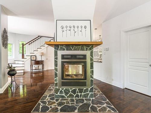 Living room - 121 Rue Du Bourgeon, Orford, QC - Indoor With Fireplace