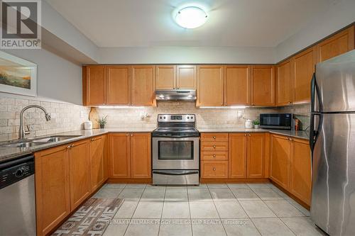 110 - 50 Mulligan Lane, Wasaga Beach, ON - Indoor Photo Showing Kitchen With Double Sink