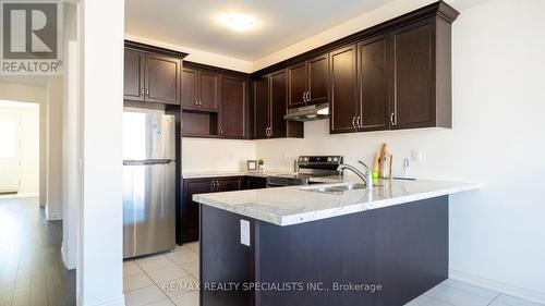 32 Benhurst Crescent, Brampton, ON - Indoor Photo Showing Kitchen With Double Sink