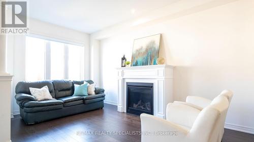 32 Benhurst Crescent, Brampton, ON - Indoor Photo Showing Living Room With Fireplace