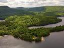 Photo aÃ©rienne - 2916  - 2918 Rive Du Lac-Tremblant, Lac-Tremblant-Nord, QC  - Outdoor With Body Of Water With View 