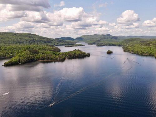 Photo aÃ©rienne - 2916  - 2918 Rive Du Lac-Tremblant, Lac-Tremblant-Nord, QC - Outdoor With Body Of Water With View