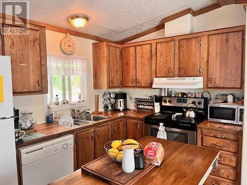 25 313 Westland Road, Quesnel, BC - Indoor Photo Showing Kitchen With Double Sink