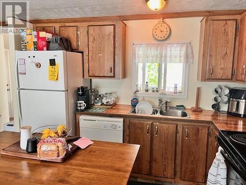 25 313 Westland Road, Quesnel, BC - Indoor Photo Showing Kitchen With Double Sink