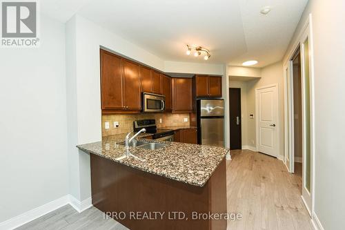 1307 - 70 Absolute Avenue, Mississauga, ON - Indoor Photo Showing Kitchen With Double Sink