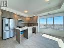 723 - 3220 William Coltson Avenue E, Oakville, ON  - Indoor Photo Showing Kitchen With Stainless Steel Kitchen 