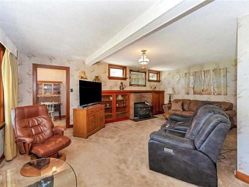 8580 North Shore Rd, Lake Cowichan, BC - Indoor Photo Showing Living Room With Fireplace