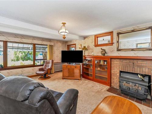 8580 North Shore Rd, Lake Cowichan, BC - Indoor Photo Showing Living Room With Fireplace