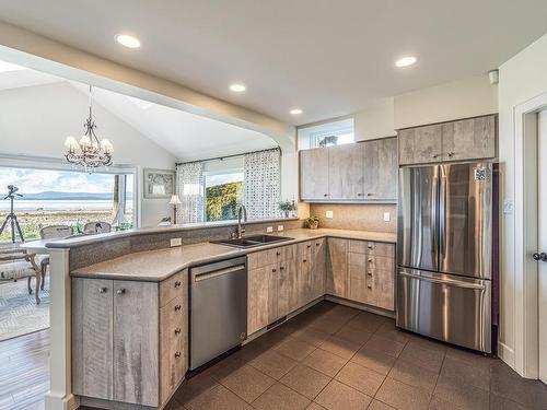 1281 Point Mercer Dr, French Creek, BC - Indoor Photo Showing Kitchen With Double Sink