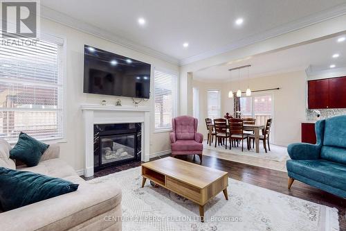 763 Shanks Heights, Milton, ON - Indoor Photo Showing Living Room With Fireplace