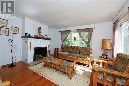 40 Island T38, Temagami, ON - Indoor Photo Showing Living Room With Fireplace