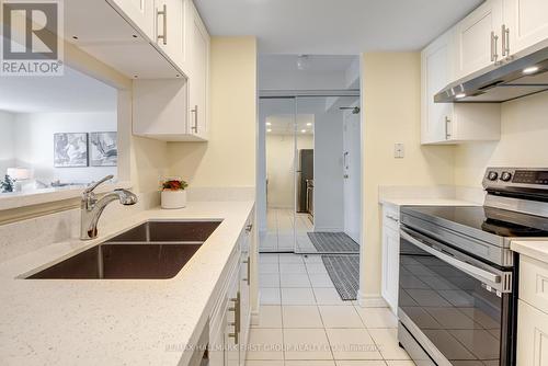 504 - 2550 Lawrence Avenue E, Toronto, ON - Indoor Photo Showing Kitchen With Stainless Steel Kitchen With Double Sink