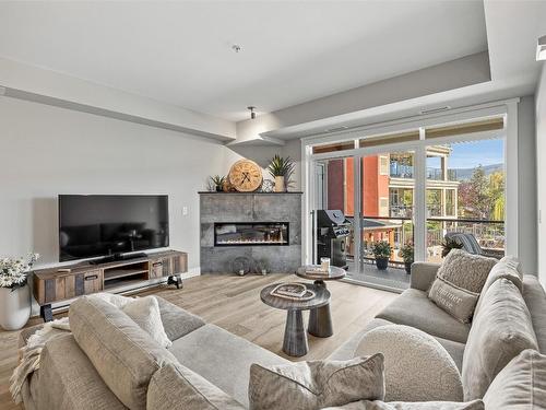 310-3865 Truswell Road, Kelowna, BC - Indoor Photo Showing Living Room With Fireplace