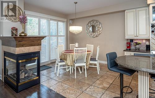 8 Carriage House Circle N, Richmond Hill, ON - Indoor Photo Showing Dining Room With Fireplace