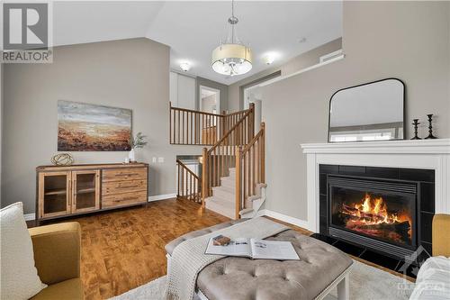 406 Vendevale Avenue, Stittsville, ON - Indoor Photo Showing Living Room With Fireplace