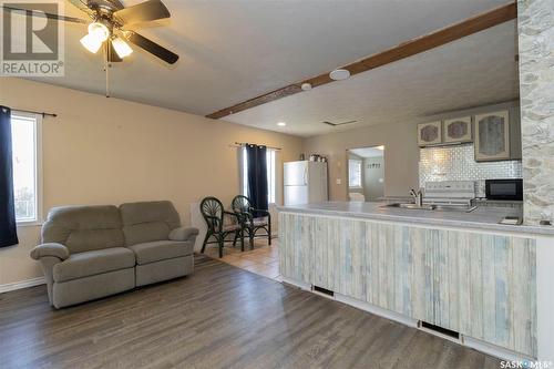 816 7Th Street, Perdue, SK - Indoor Photo Showing Living Room With Fireplace