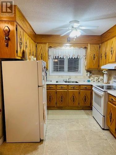 408 Main Street, New Wes Valley, NL - Indoor Photo Showing Kitchen With Double Sink