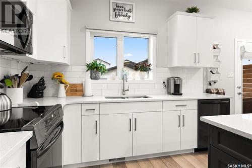 3221 Valley Green Road, Regina, SK - Indoor Photo Showing Kitchen With Double Sink