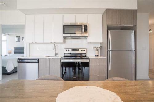 3200 Dakota Common|Unit #B202, Burlington, ON - Indoor Photo Showing Kitchen With Stainless Steel Kitchen