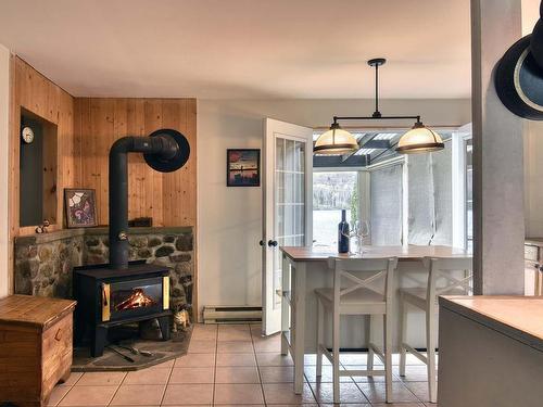 Dinette - 76  - 76-2 Ch. Du Lac-Chaud, La Macaza, QC - Indoor With Fireplace