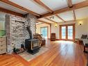 347 Millstream Lake Rd, Highlands, BC  - Indoor Photo Showing Living Room With Fireplace 