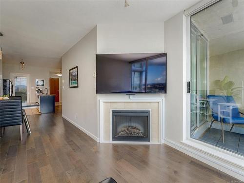 1001-160 Wilson St, Victoria, BC - Indoor Photo Showing Living Room With Fireplace