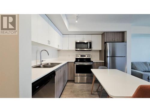 695 Academy Way Unit# Ph9, Kelowna, BC - Indoor Photo Showing Kitchen With Double Sink With Upgraded Kitchen