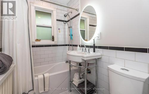 #Main -22 Strathgowan Ave, Toronto, ON - Indoor Photo Showing Bathroom