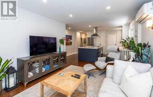 #Main -22 Strathgowan Ave, Toronto, ON - Indoor Photo Showing Living Room