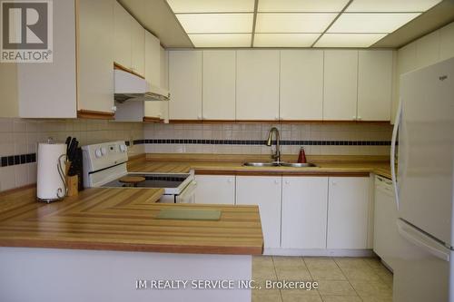 305 - 310 Mill Street S, Brampton, ON - Indoor Photo Showing Kitchen With Double Sink