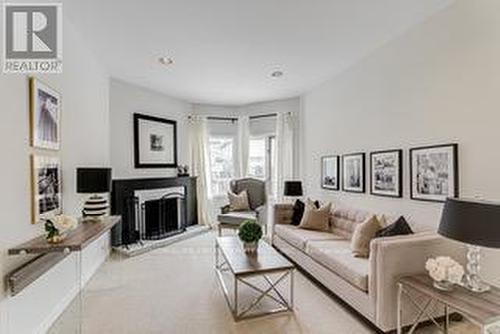 255 Elmwood Avenue, Toronto, ON - Indoor Photo Showing Living Room With Fireplace