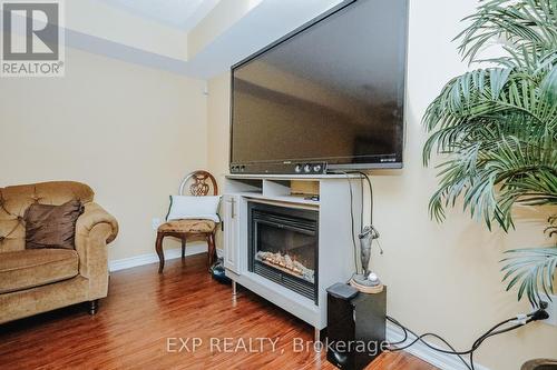 3358 C Kingston Road, Toronto, ON - Indoor Photo Showing Living Room With Fireplace