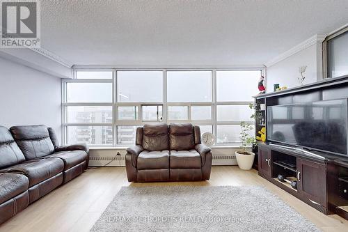 902 - 3380 Eglinton Avenue E, Toronto, ON - Indoor Photo Showing Living Room