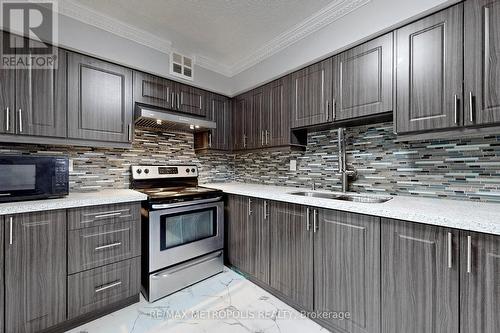 902 - 3380 Eglinton Avenue E, Toronto, ON - Indoor Photo Showing Kitchen With Upgraded Kitchen