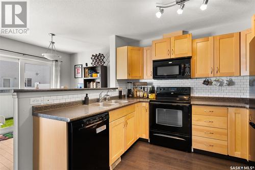 19 2751 Windsor Park Road, Regina, SK - Indoor Photo Showing Kitchen With Double Sink