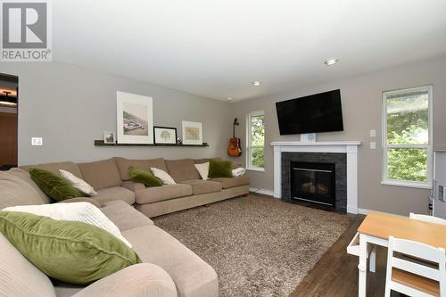 2406 Forest Drive, Blind Bay, BC - Indoor Photo Showing Living Room With Fireplace