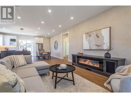 5084 Twinflower Crescent, Kelowna, BC - Indoor Photo Showing Living Room With Fireplace
