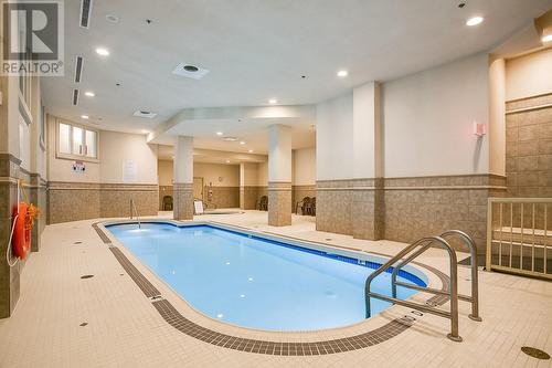 1128 Sunset Drive Unit# 1603, Kelowna, BC - Indoor Photo Showing Other Room With In Ground Pool