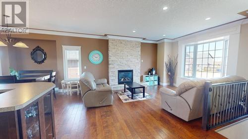 11716 96A Street, Fort St. John, BC - Indoor Photo Showing Living Room With Fireplace
